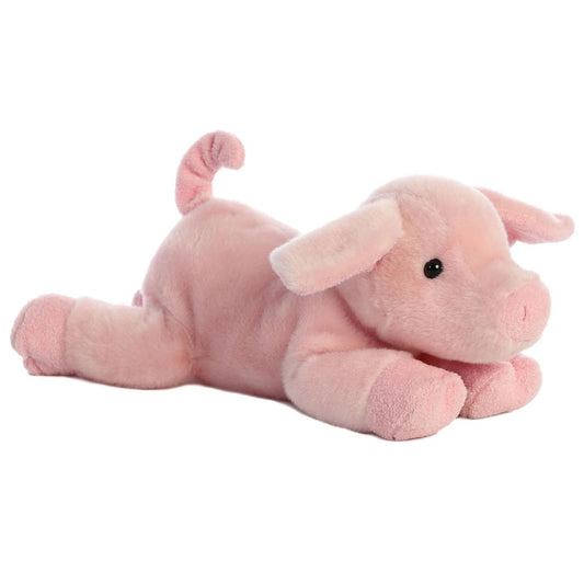Angled front view of the pink piglet stuffed animal highlighting its sweet face, plush snout, and lounging posture.