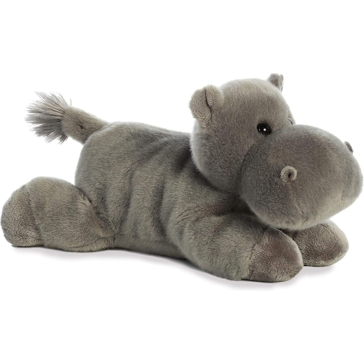 Angled front view of the Aurora Flopsie Howie Hippo 12-inch plush resting on its belly, featuring soft gray fur and a large snout.