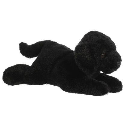 Angled front view of the 12-inch Aurora Flopsie Blackie Black Labrador stuffed animal lying down, showing his sleek black fur.
