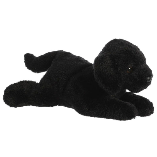 Angled front view of the 12-inch Aurora Flopsie Blackie Black Labrador stuffed animal lying down, showing his sleek black fur.