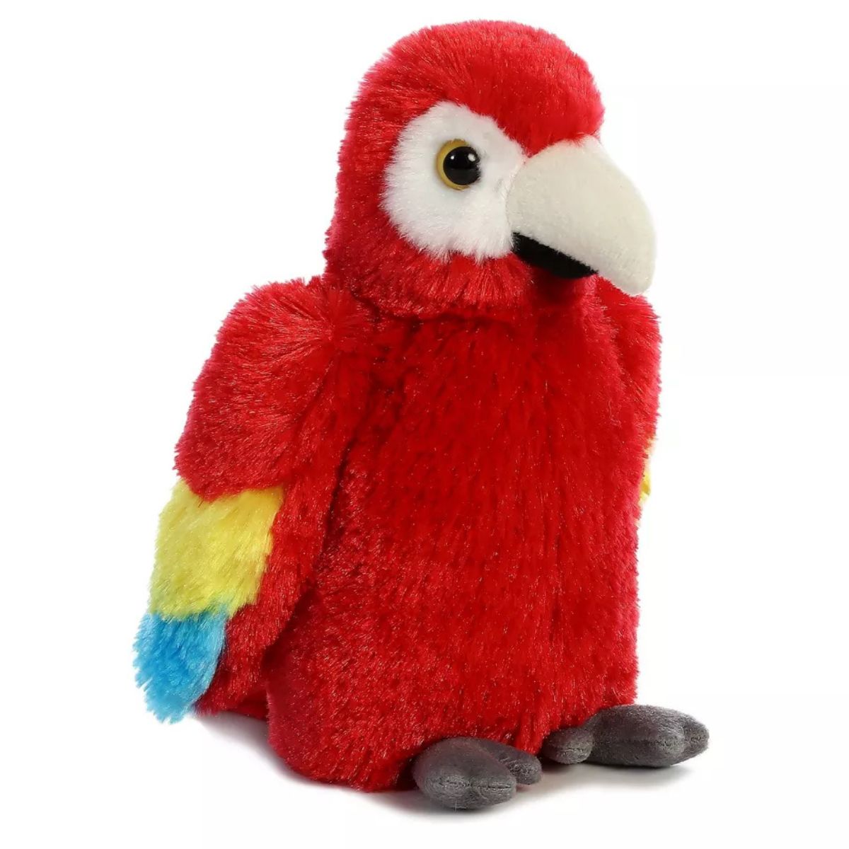 Angled side view of the 8-inch Aurora Mini Flopsie Scarlet Macaw plush featuring bright red, yellow, and blue feathers.