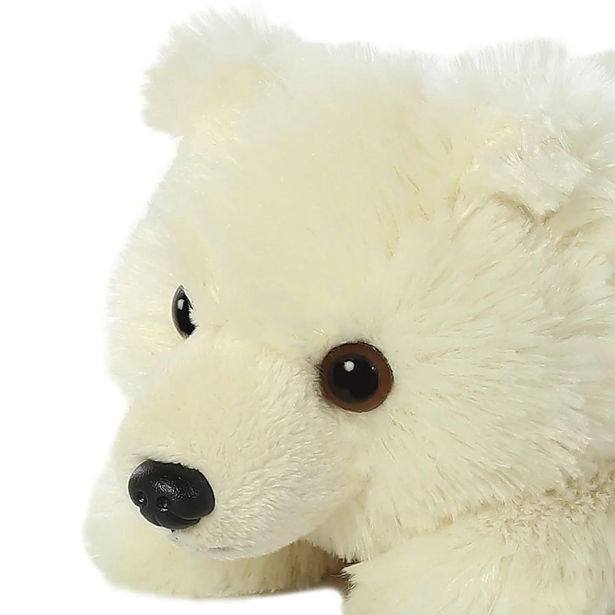 Close-up view of the polar bear's face highlighting its sweet black nose, dark eyes, and soft plush texture.