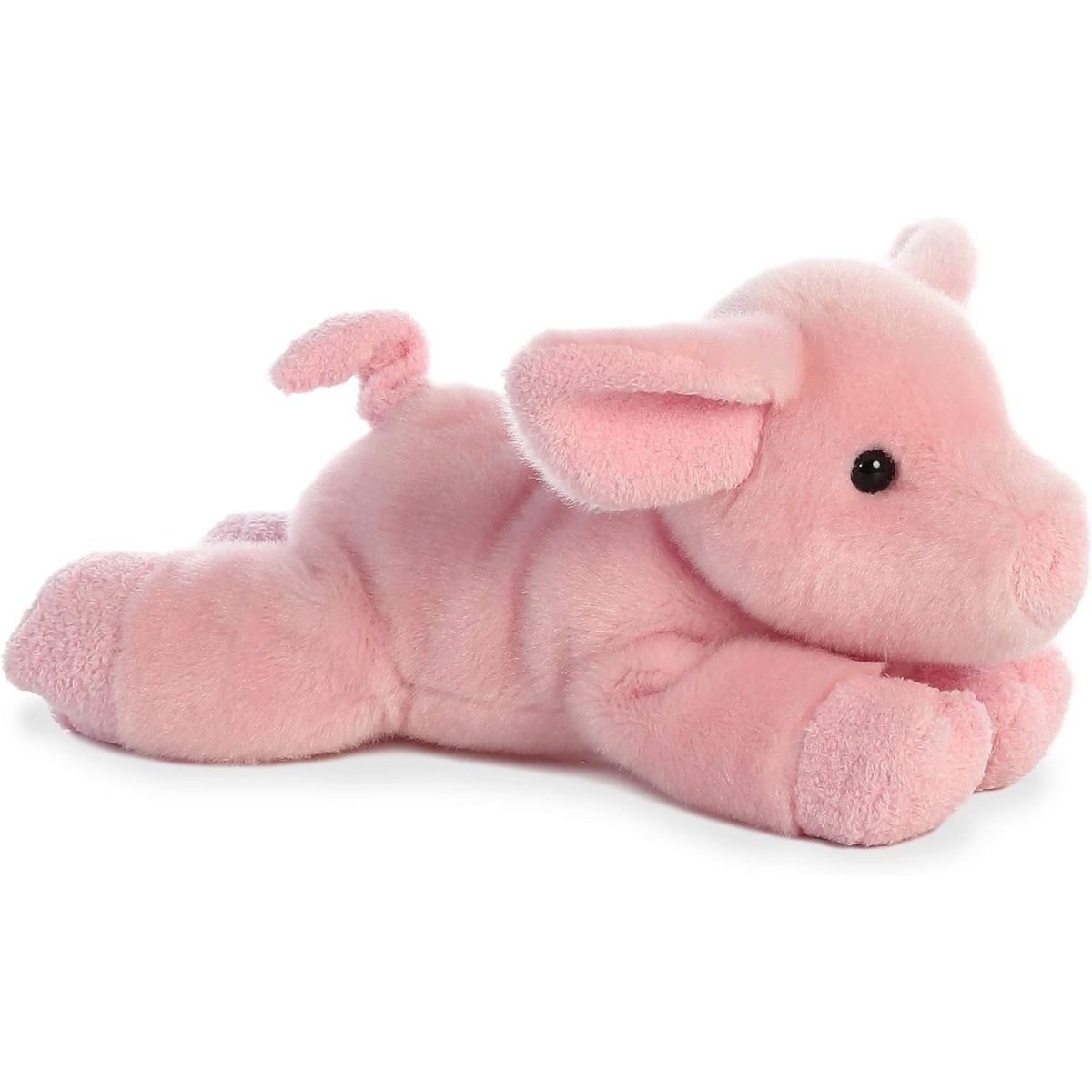 Side view of the Aurora Mini Flopsie Pickles the Piglet 8-inch plush resting on its belly, featuring soft pink fur and a curly tail.