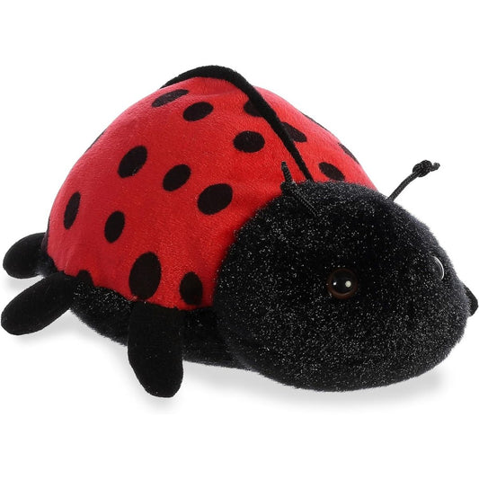 Angled view of the Aurora Mini Flopsie 8-inch Ladybug plush showing its red and black spotted shell and cute fuzzy face.