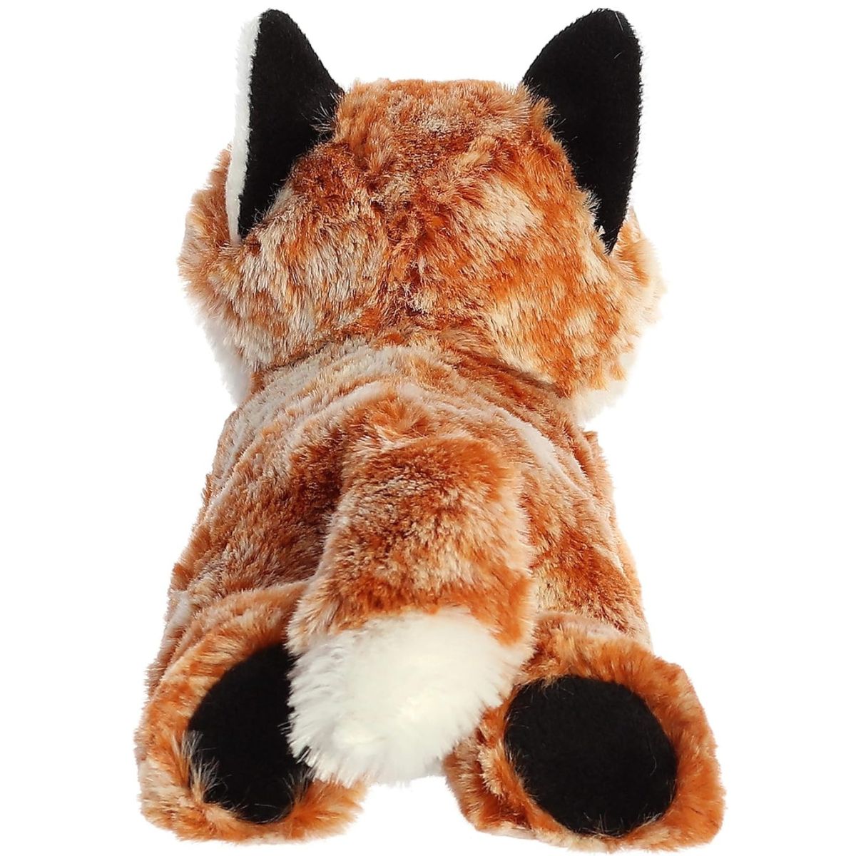 Back view of the Aurora Flopsie fox plush toy showing its soft reddish-brown back, fluffy white-tipped tail, and black foot pads.