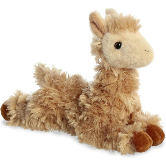 Angled side view of the Aurora Mini Flopsie Louis Llama 8-inch plush resting on its belly, featuring shaggy tan fur and a cream muzzle.