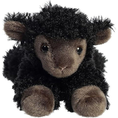 Straight front view of the black lamb plush showing its sweet dark eyes, floppy ears, and little resting hooves.