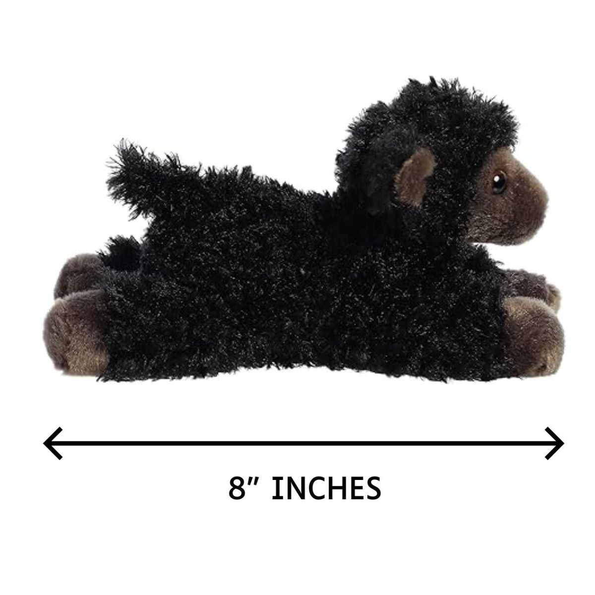 Side profile view of the Mini Flopsie Ebony the Lamb plush laying down alongside a measurement line to demonstrate its 8-inch length.