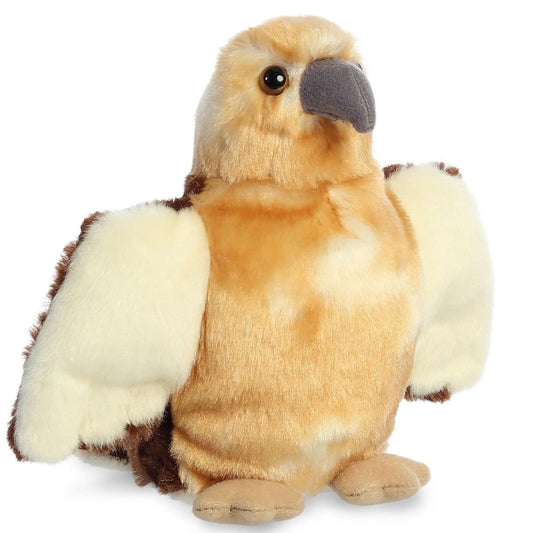 Angled view of the Aurora Mini Flopsie 8-inch Ranger the Hawk plush sitting upright with wings slightly spread, showing its tan chest and brown wings.