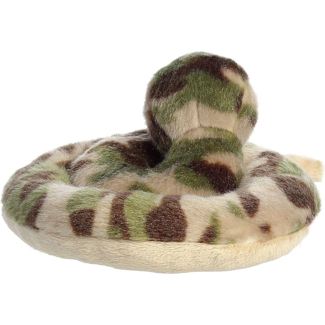 Rear view of the Slick Snake plush focusing on the round coils and its segmented plush rattle tail.