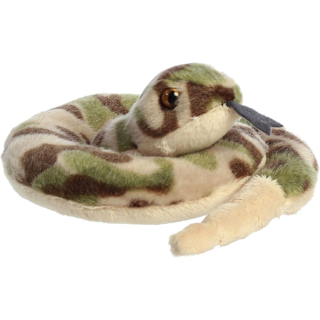 Angled front view of the Aurora Mini Flopsie Slick Snake 8-inch plush in a coiled position, featuring green and brown camo patterns.