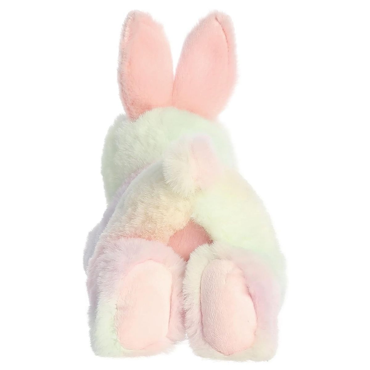 Back view of the Aurora Flopsie bunny plush toy showing its soft pastel tie-dye back, pink hind foot pads, and a fluffy little tail.