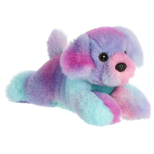 Angled side profile view of the 8-inch Aurora Mini Flopsie Rainbow Puppy plush resting on its belly.