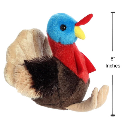 Side profile view of the turkey plush with a dimension line indicating its 8-inch height, showing its upright seated posture.