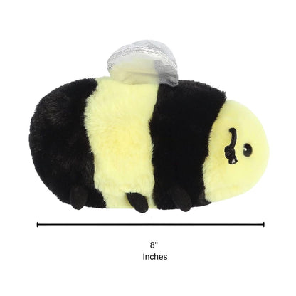 Side profile view of the Beeswax Bee plush resting on its tummy with a measurement graphic indicating it is 8 inches long.