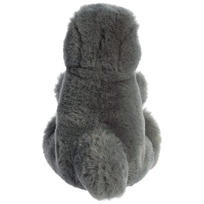 Back view of the Aurora dinosaur plush showcasing its soft grey back and thick tail.