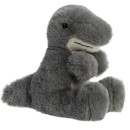 Angled side view of the 8-inch Aurora Mini Flopsie T-Rex plush featuring soft grey fur, a lighter underbelly, and tiny dinosaur arms.