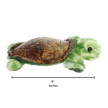 Side profile sizing graphic for the Aurora Mini Flopsie Splish Sea Turtle plush resting on its belly, indicating a total length of 8 inches.