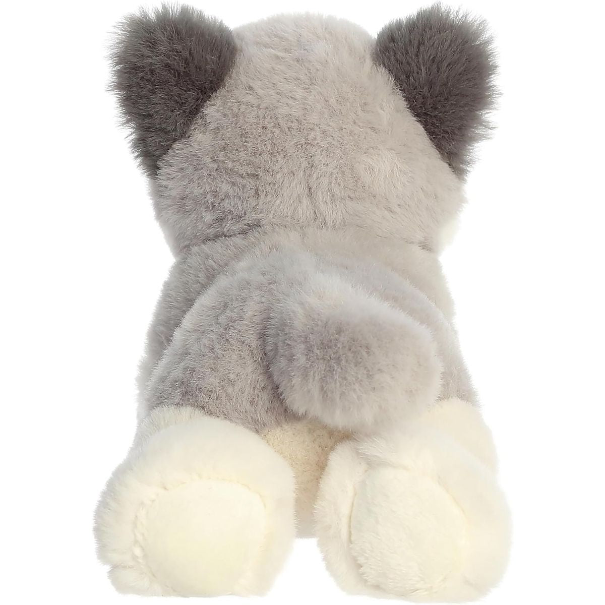 Direct back view of the cuddly wolf pup plush highlighting its grey back, tail, and white hind paws.