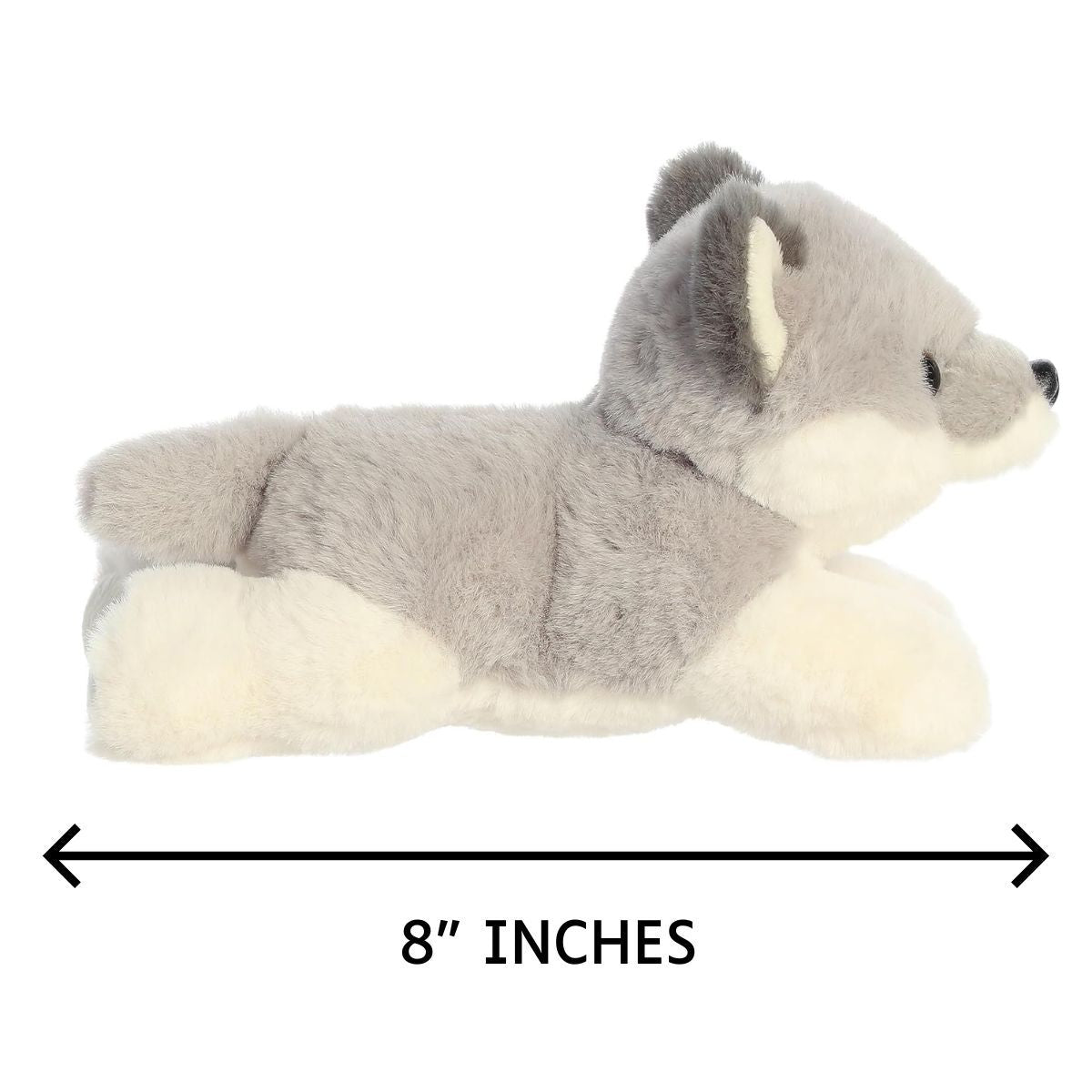 Side profile view of the wolf pup plush resting on its tummy with a measurement graphic indicating it is 8 inches long.