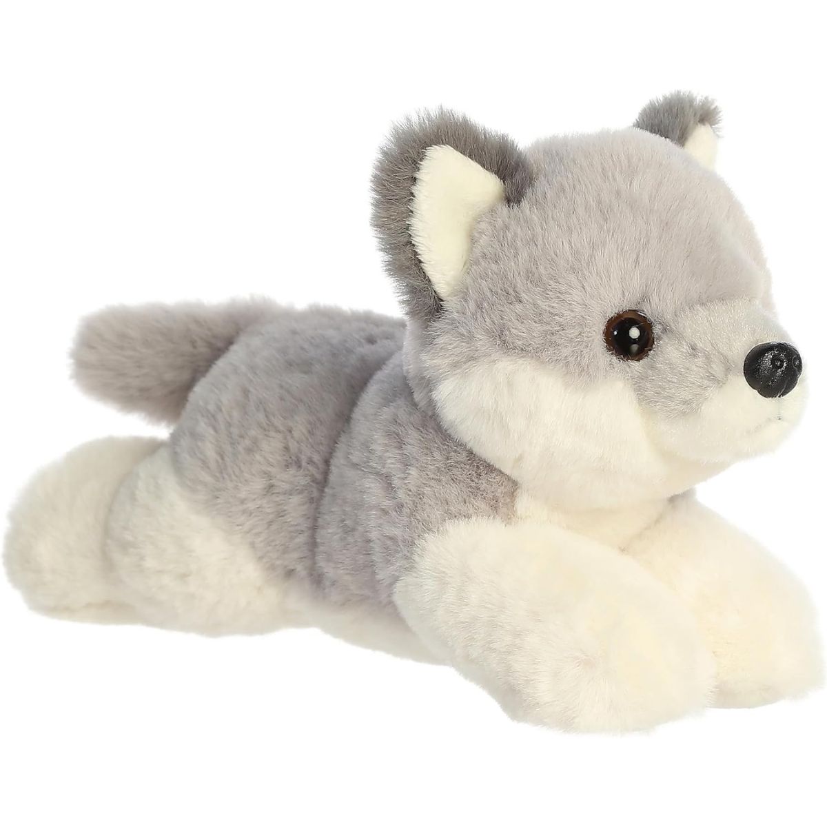 Angled front view of the 8-inch Aurora Mini Flopsie Wolf Pup stuffed animal lying down, showing its grey and white fur.