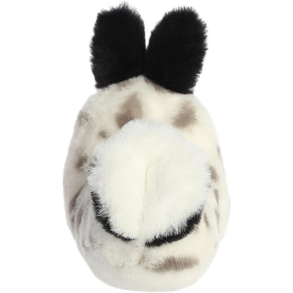 Direct back view of the cuddly sea bunny stuffed animal highlighting its fluffy black and white gill plume.