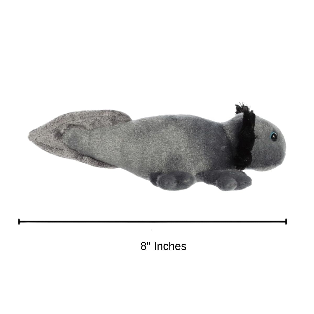 The Aurora 8-inch Xochitl Black Axolotl plush toy resting on a surface showing its compact size.
