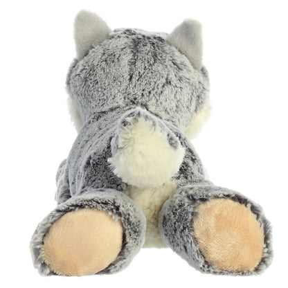 Rear view of the Winter Wolf plush showing its grey back, fluffy tail, and the soft tan paw pads on its back feet.