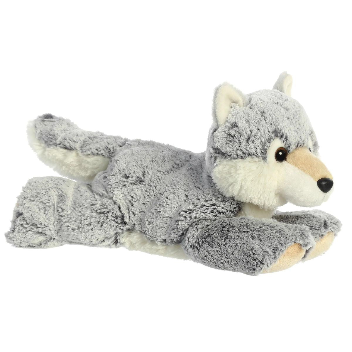 Angled front view of the Aurora Flopsie Winter Wolf 12-inch plush resting on its belly, featuring textured grey fur and a creamy white muzzle.