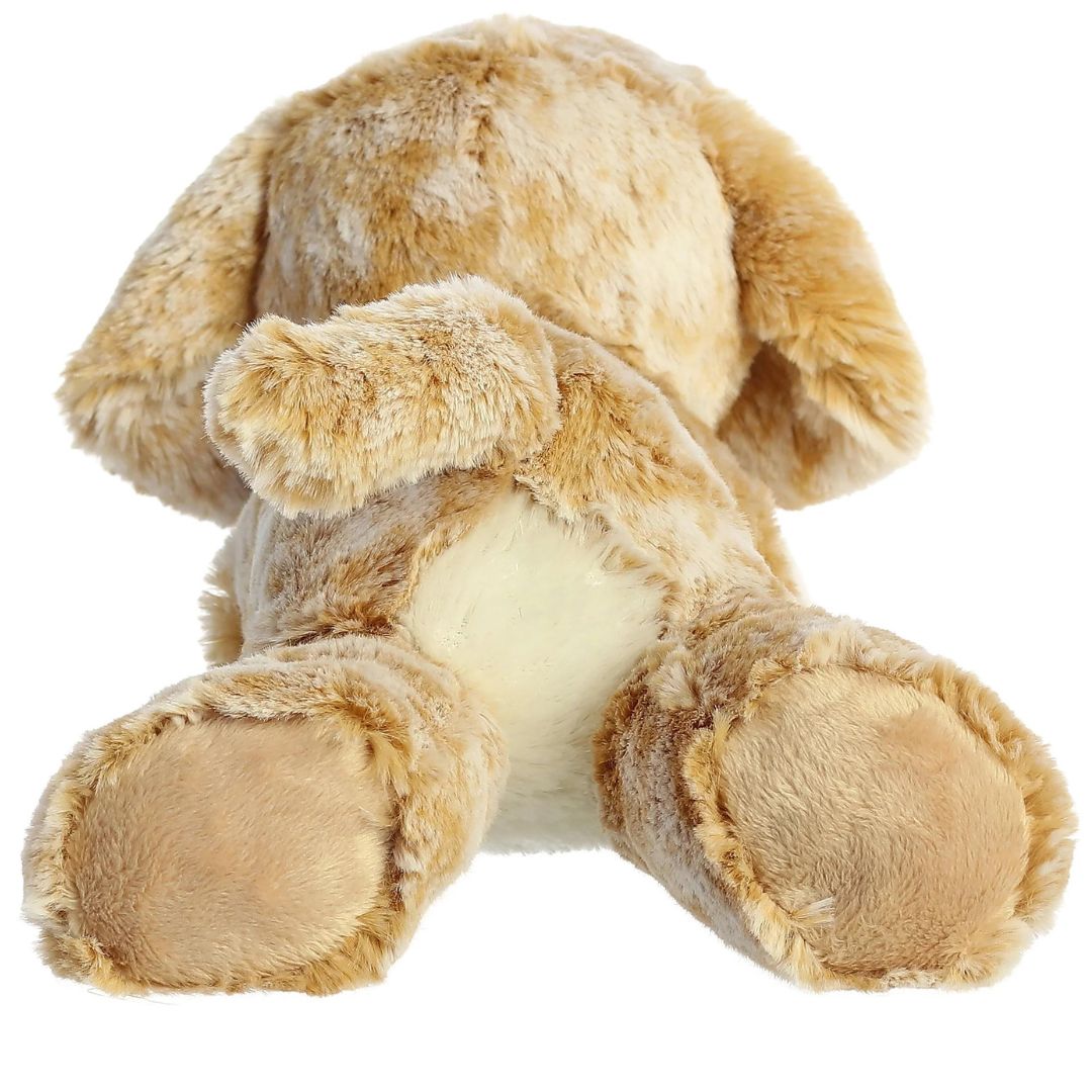 Rear view of the Rusty Retriever plush showing its golden back, perky tail, and large soft back paws.