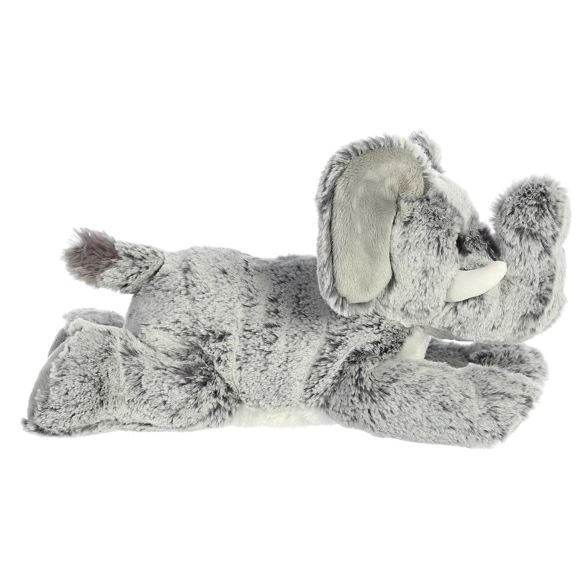 Side profile view of the gray elephant plush showing its lounging posture and small tail.
