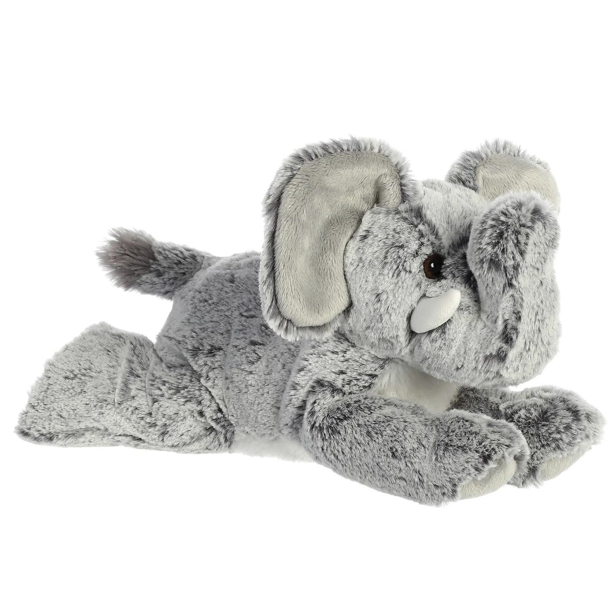 Angled front view of the Aurora Flopsie Leroy the Elephant 12-inch plush resting on its belly, featuring textured gray fur and a raised trunk.