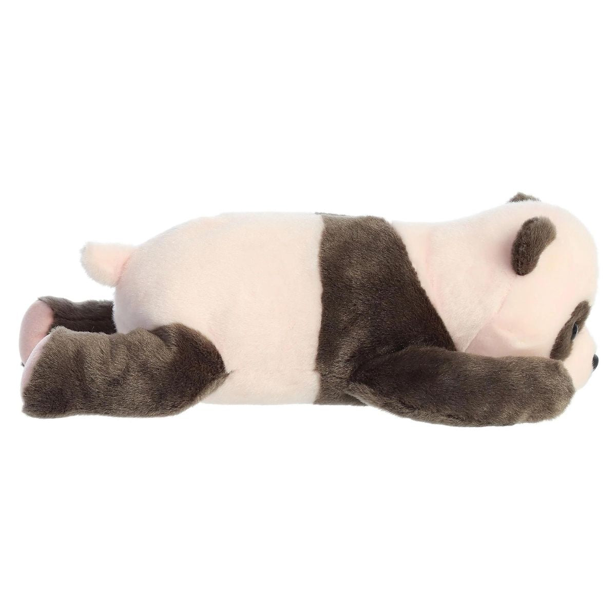 Side profile view of the newborn panda plush showing its lounging posture and the dark band of fur across its back.