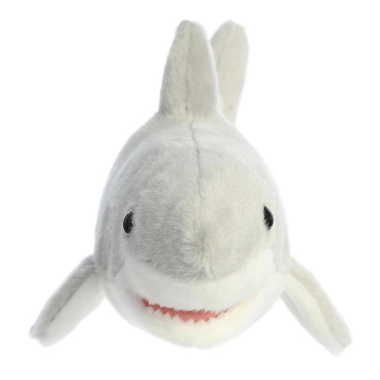 Straight front view of the shark stuffed animal highlighting its dark eyes, outstretched pectoral fins, and open mouth with soft white teeth.