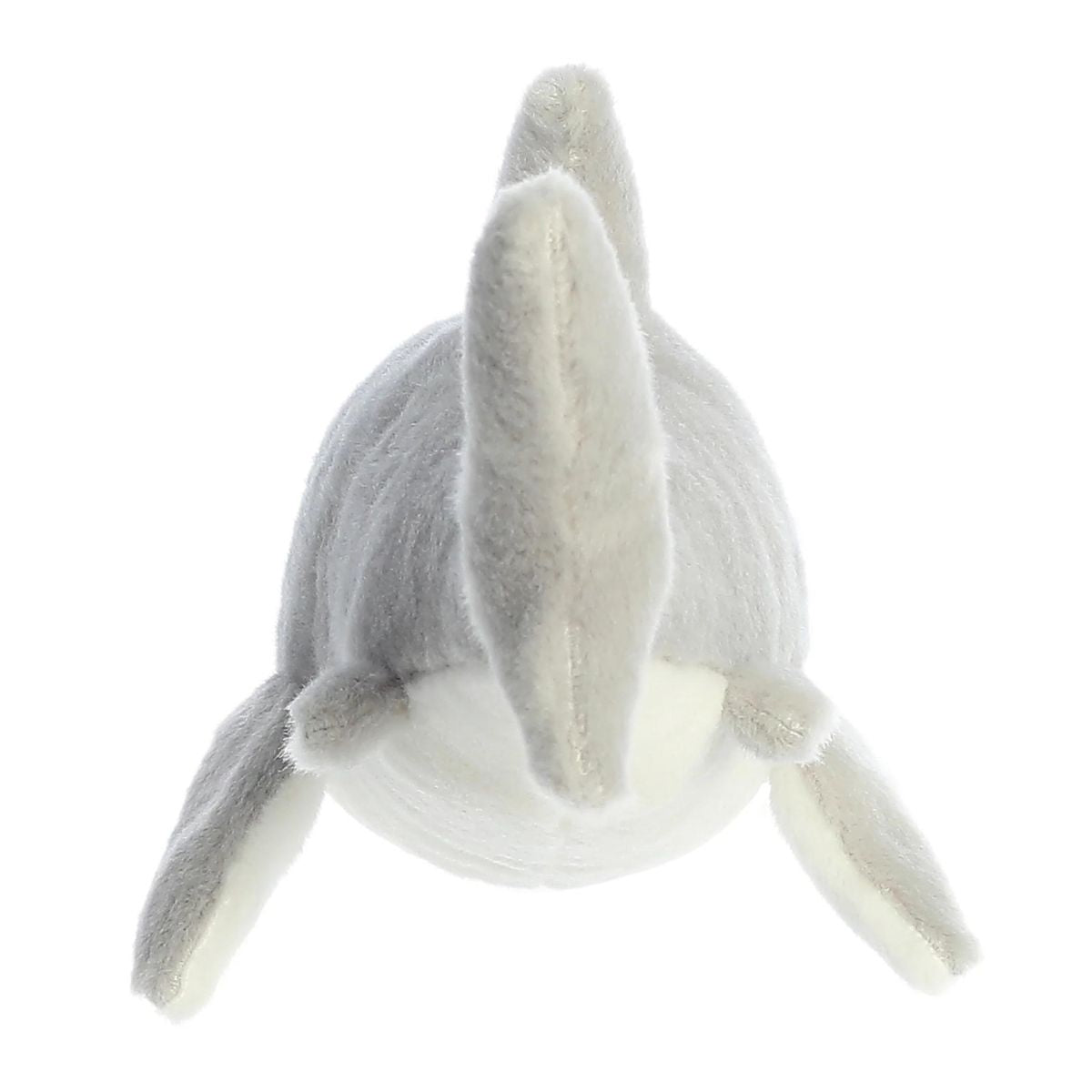 Rear view of the Great White Shark plush showing its gray back, top dorsal fin, and soft tail resting on the surface.