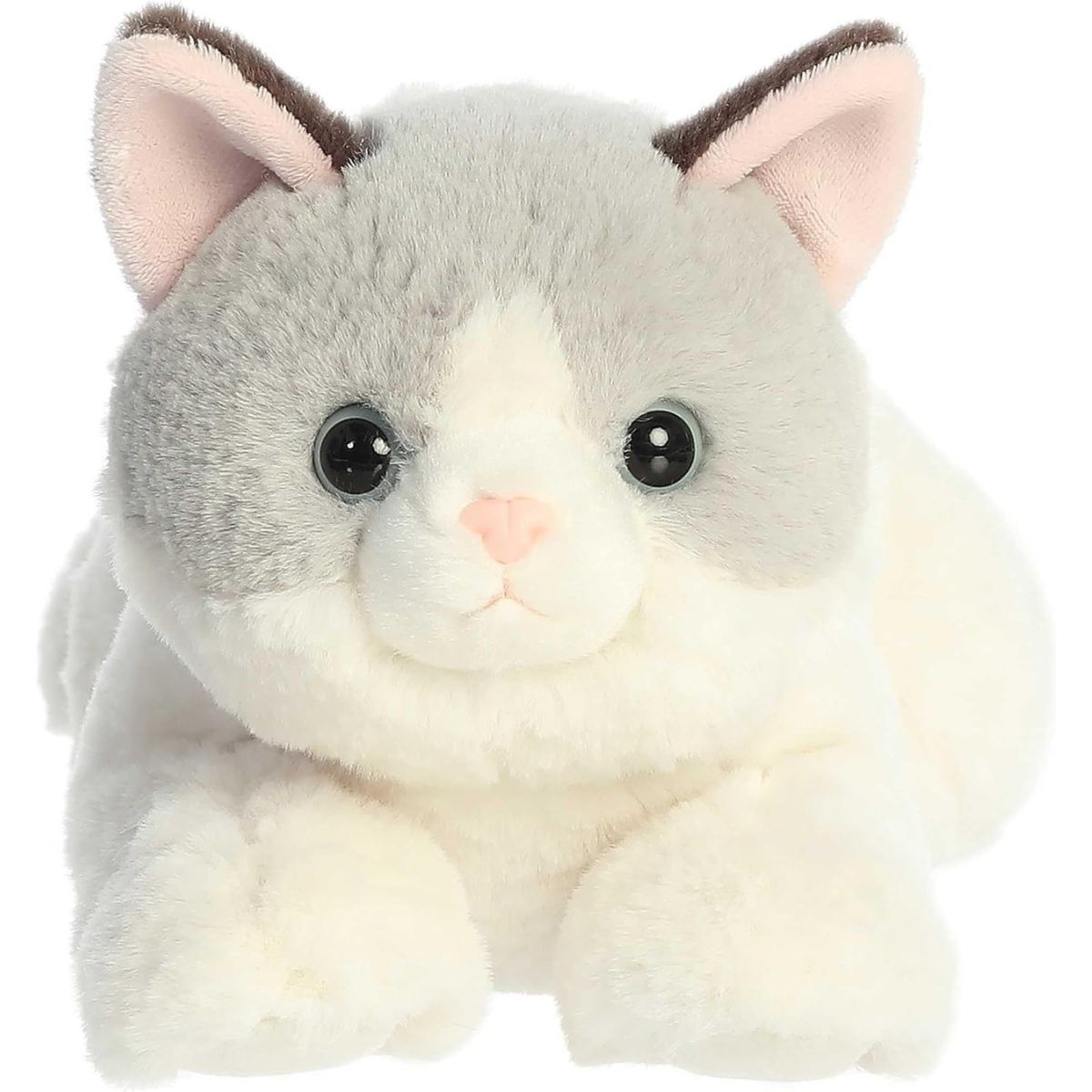 Direct front view of the soft grey and white plush cat lying down, highlighting its pink nose and dark eyes.