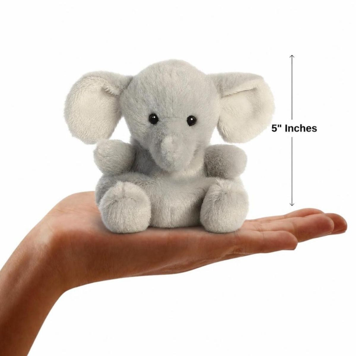 The miniature Stomps Elephant plush sitting balanced in an open human hand under a 5-inch height graphic indicator.