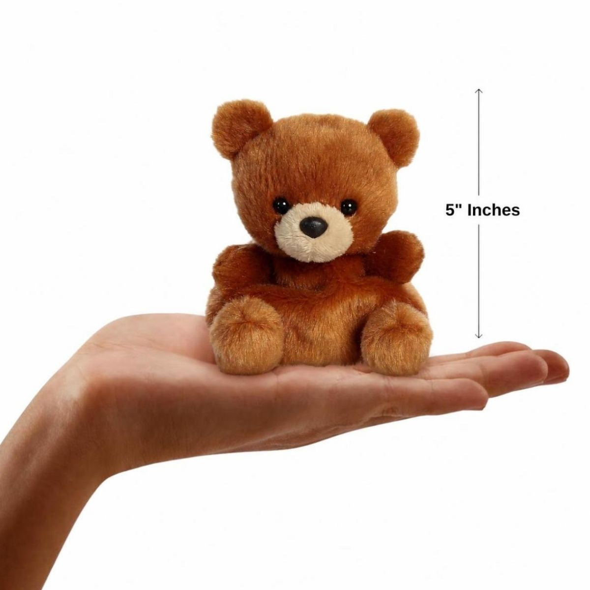 The miniature Artie Bear plush sitting balanced in an open human hand under a 5-inch height graphic indicator.