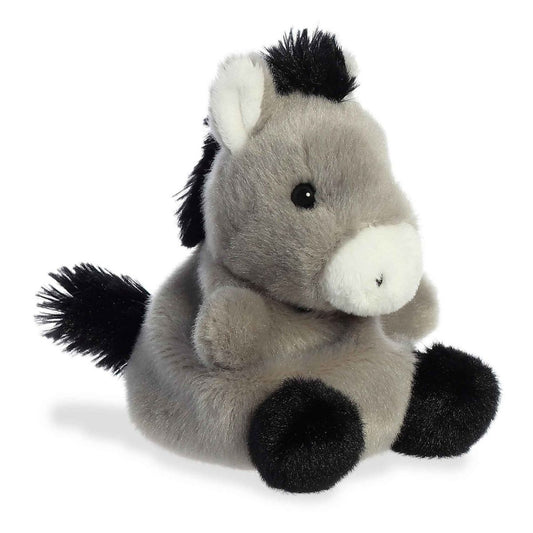 Aurora 5-inch Palm Pals Eli Donkey plush toy sitting at an angle showing its soft gray fur, crisp white muzzle, fluffy black mane, and pointed ears.