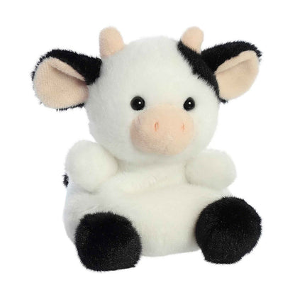 Angled front view of the 5-inch Aurora Palm Pals Sweetie Cow black and white plush toy.