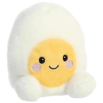 Aurora 5-inch Palm Pals Bobby Egg plush toy sitting at an angle showing its smooth white body, bright yellow yolk face, and happy expression.