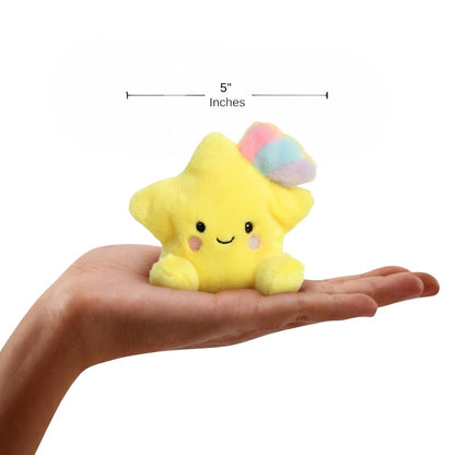 The miniature Pisces Shooting Star plush sitting balanced in an open human hand under a 5-inch height graphic indicator.