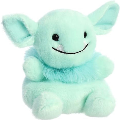 Aurora 5-inch Palm Pals Gribble Goblin plush toy showing its soft mint-green body, large pointed ears, shaggy teal fur neck ruff, and smiling face with tiny white fangs.
