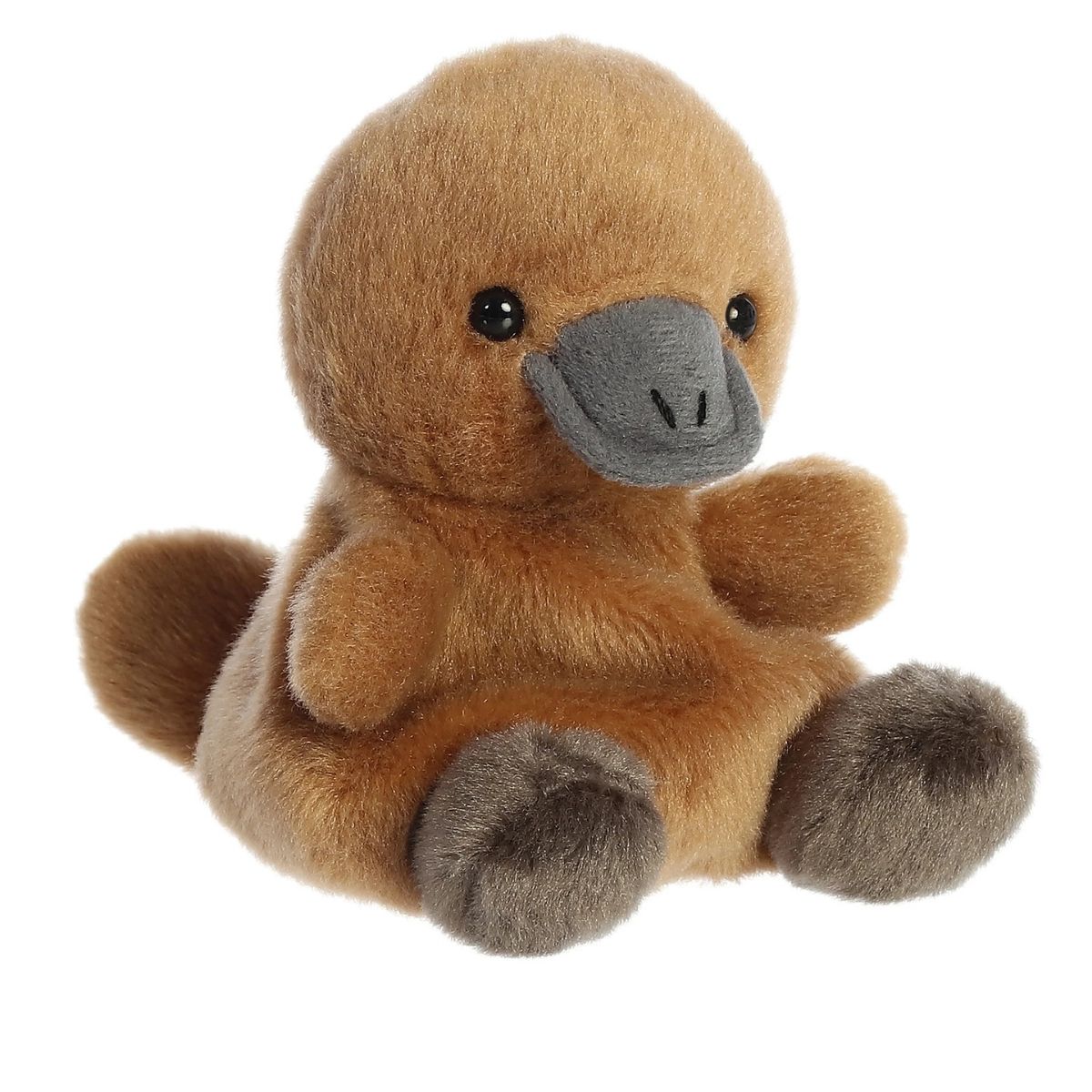 Aurora 5-inch Palm Pals Patty Platypus plush toy sitting at an angle showing its golden-brown fur, gray duck bill, gray webbed feet, and flat paddle tail.