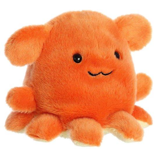 Aurora 5-inch Palm Pals Ditsy Octopus plush toy showing its vibrant orange body, ear-like top fins, dark safety eyes, and stitched smile.