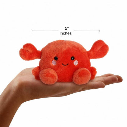 The miniature Snippy Crab plush sitting balanced in an open human hand under a 5-inch height graphic indicator.