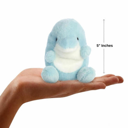 The miniature Clicks Dolphin plush sitting balanced in an open human hand under a 5-inch height graphic indicator.