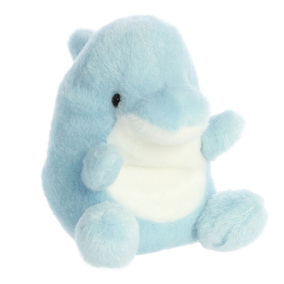 Aurora 5-inch Palm Pals Clicks Dolphin plush toy sitting at an angle showing its pastel light blue fur, soft white underbelly, and tiny side flippers.