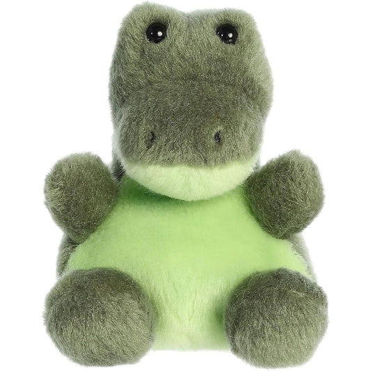 Aurora 5-inch Palm Pals Scales Alligator plush toy sitting forward showing its olive-green body, light lime-green chest, and glossy black eyes.