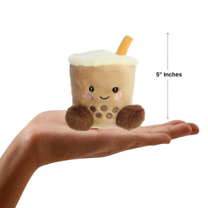 Sizing graphic for the Aurora Palm Pals Milky Tea Boba plush showing it sitting perfectly in the palm of a hand, indicating a total height of 5 inches.